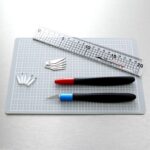 Jakar Cutting Set 6 Piece, A5 Cutting Mat, 20cm Acrylic Cutting Ruler, 1 Fixed And 1 Swivel Bladed Hobby Knife, With 5 Spare Blades Of Each In Two Boxes, Hanging Pack