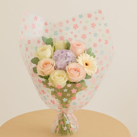 Oasis Pink Scattered Flower Cellophane Wrap (Roll & Folded) – 80cm Wide, Folded, Recyclable Floral Film